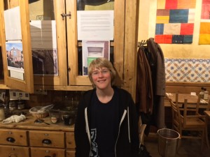 Whitby School student Simon H displaying his "Photo Voice" project at Le Pain Quotidien.