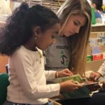 Room to Grow preschoolers enjoyed having high school buddies read to them.